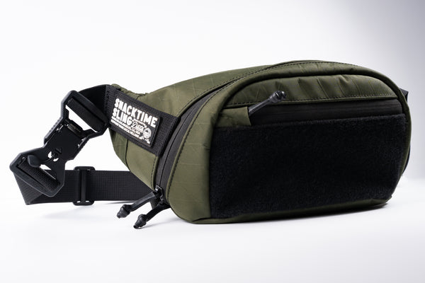 Snacktime Sling™ (X-PAC - Desert Olive / Hi-Vis Orange)